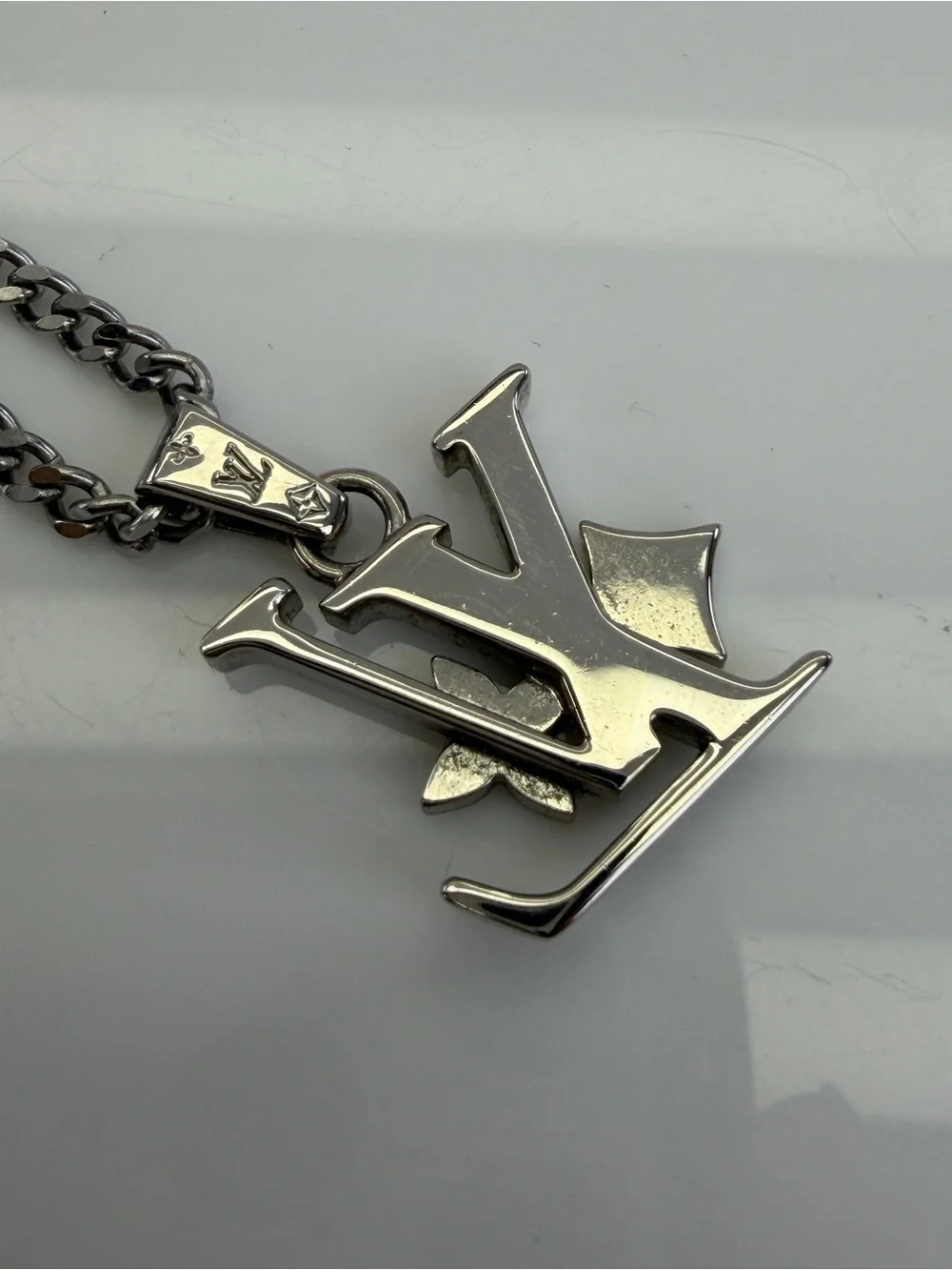 Louis Vuitton Silver LV Monogram Row Pendant Necklace